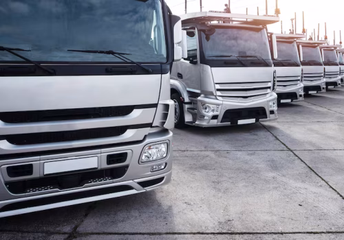 group-trucks-parked-row_342744-533